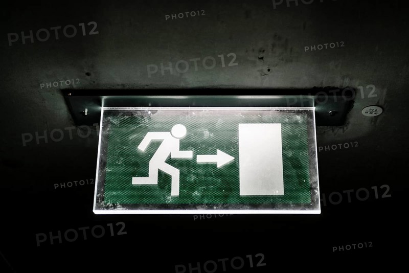 Illuminated emergency exit sign
