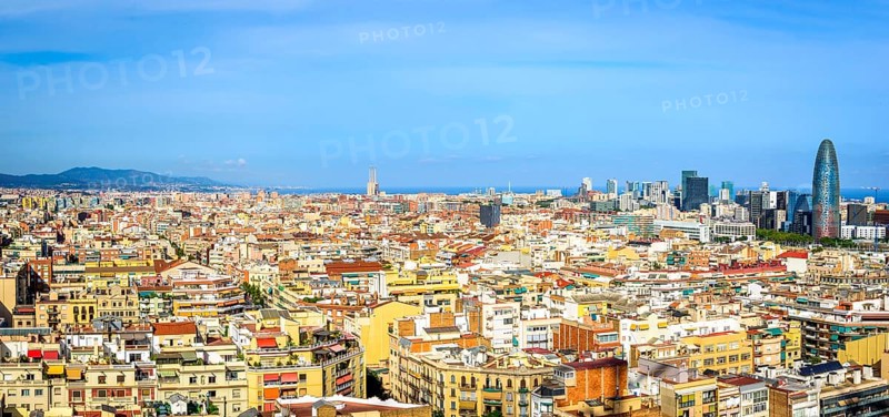 City view with houses and Torre Agbar by architect Jean Nouvel