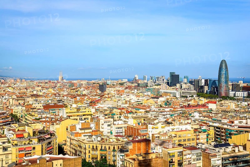 City view with houses and Torre Agbar by architect Jean Nouvel