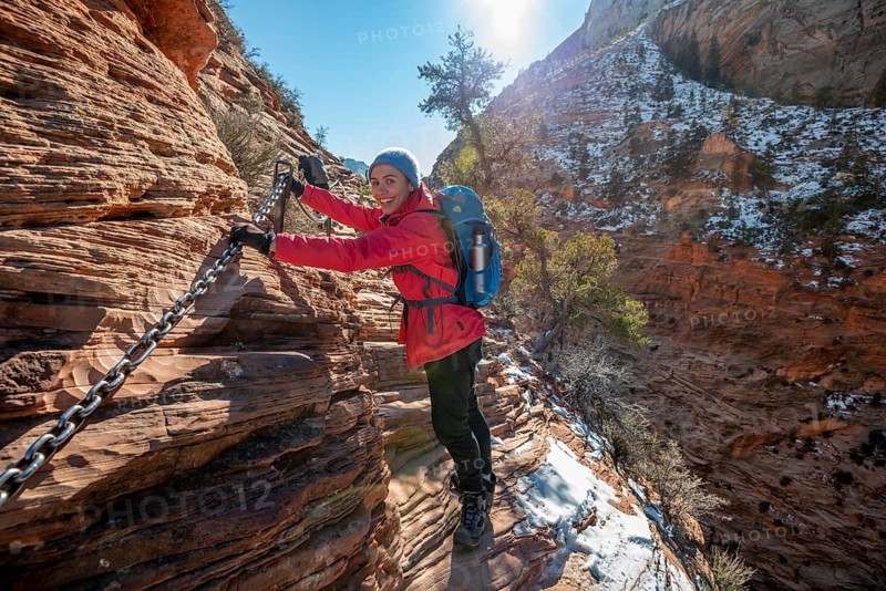 Young woman hiking on the via ferrata of the Angels Landing Trail
