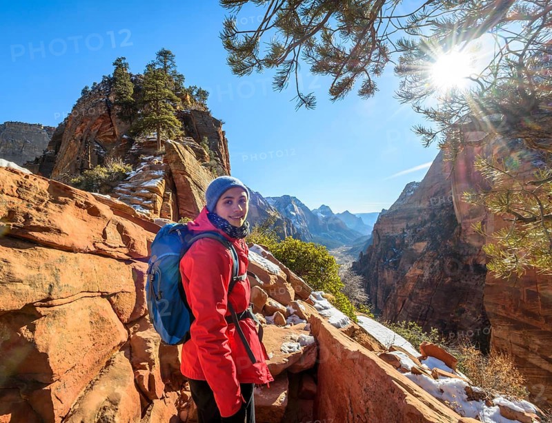 Young woman hiking on the via ferrata to Angels Landing