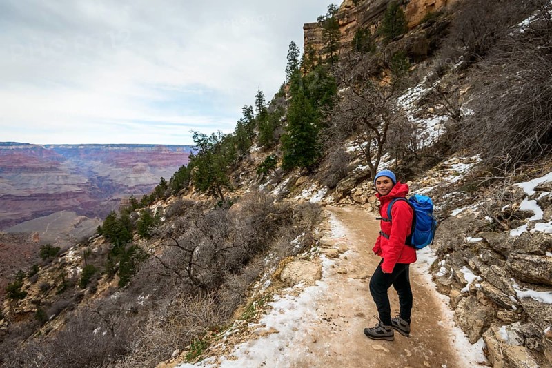 Young woman descending into the Grand Canyon