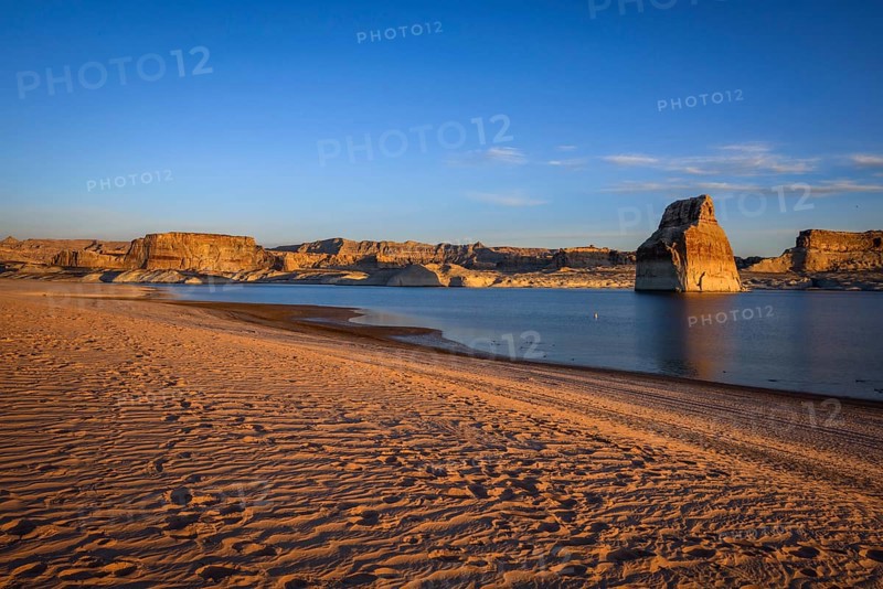 Morning sun at the sandy beach of Lone Rock Beach at Lake Powell
