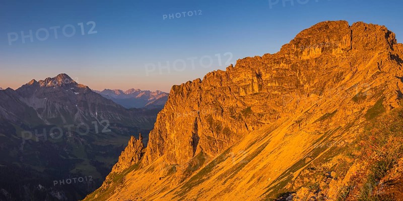 View from Krumbach highroute under morning sun to Biberkopf