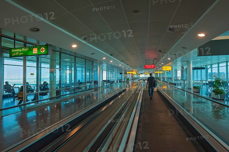 Moving walkway and smoking room at the airport