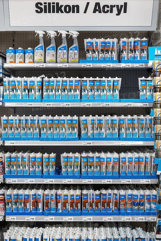 Shelves with silicone and acrylic in hardware store