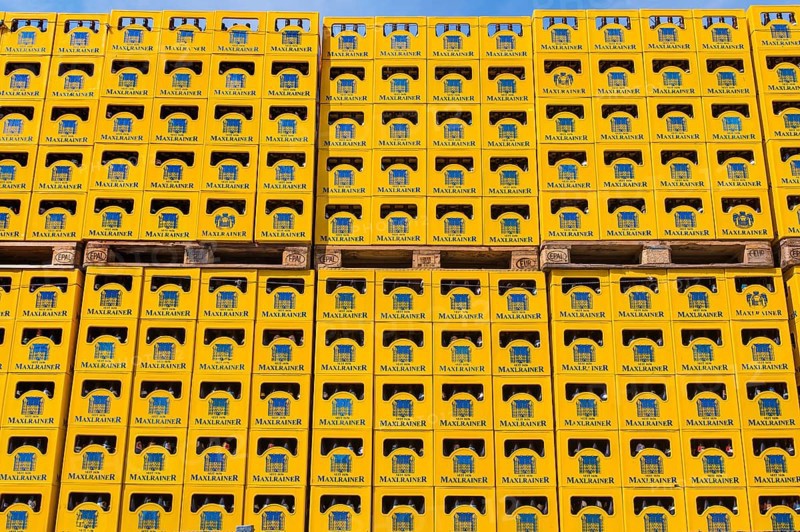 Stack with beer crates of the Schlossbrauerei Maxlrain near Tuntenhausen