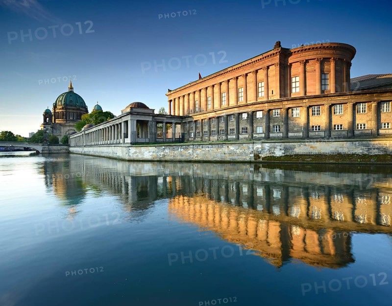 Alte Nationalgalerie and arcades reflecting in the river Spree
