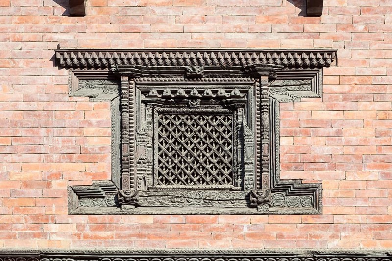 Beautifully carved wooden window at the royal palace Patan Durbar square