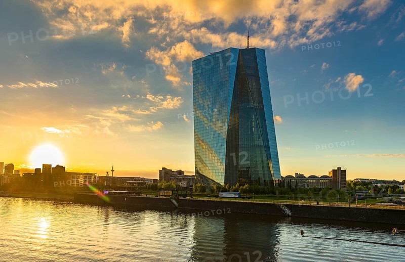 European Central Bank at sunset with skyline