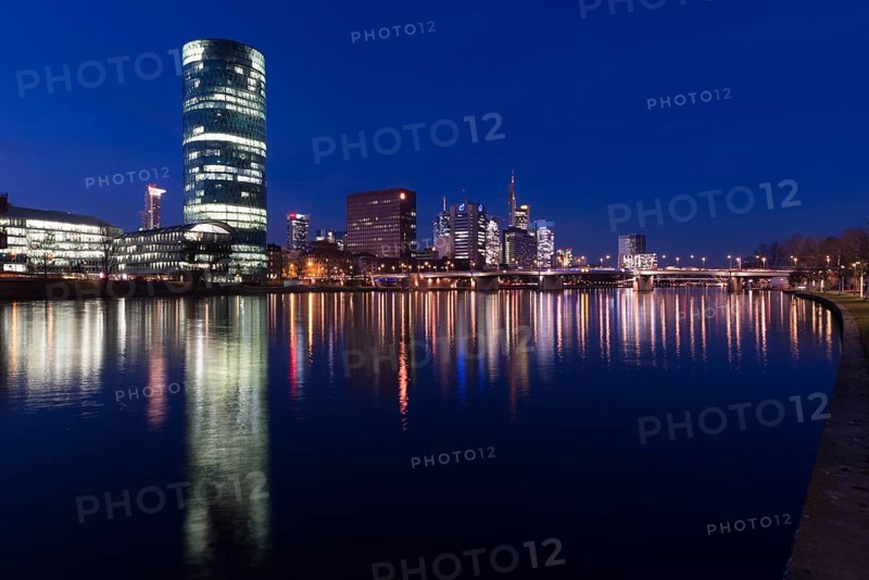 Skyline of Frankfurt from the banks of the Main with the Westhafen Tower