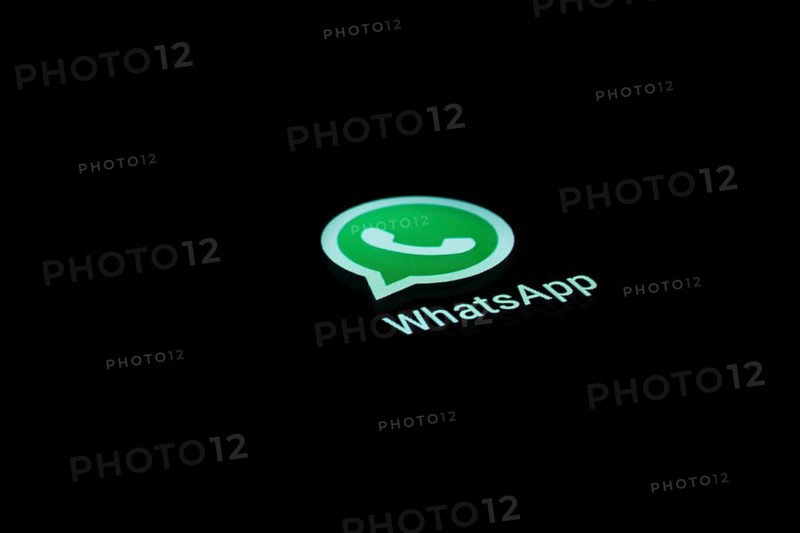 WhatsApp app icon on a display