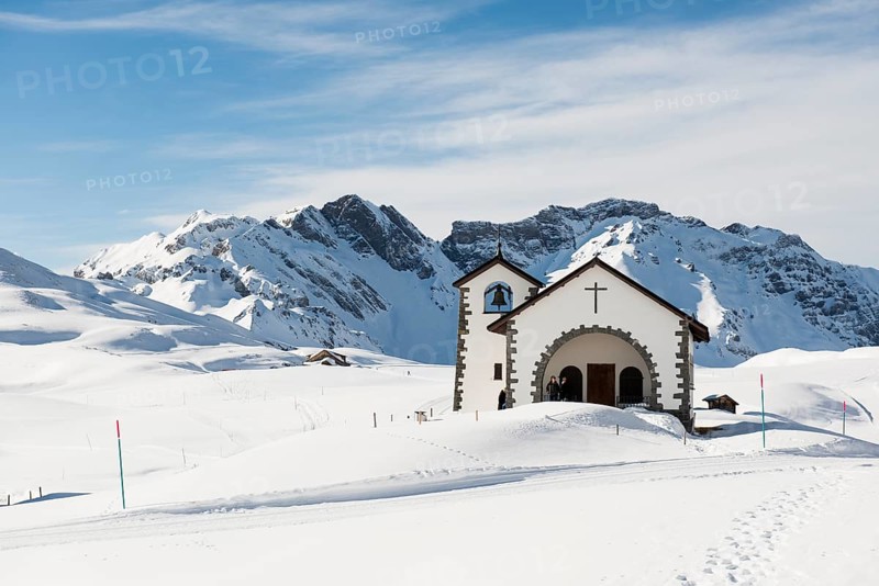 Chapel in a snowy winter landscape