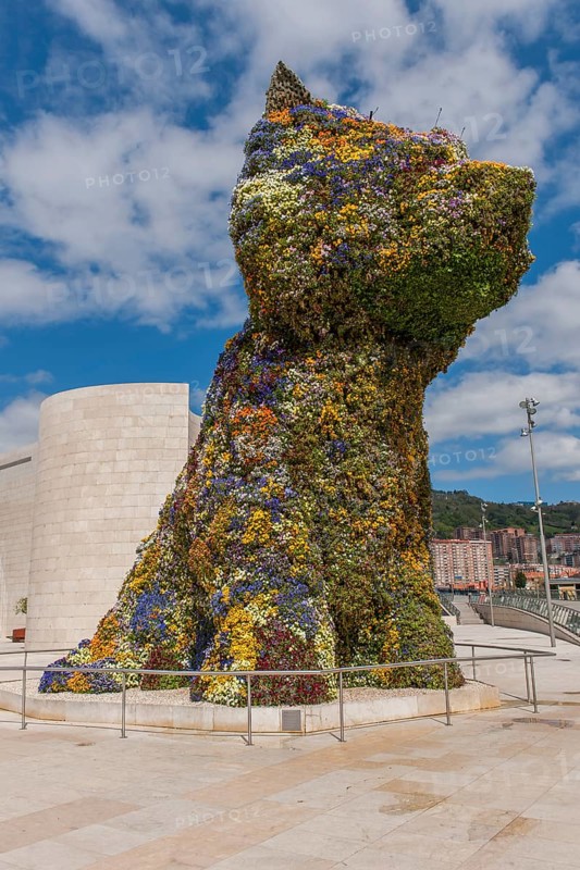 Sculpture Puppy by Jeff Koons in front Guggenheim Museum Bilbao