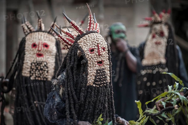 Men of the ethnic group of the Bamileke with traditional masks