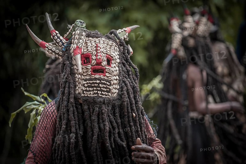 Men of the ethnic group of the Bamileke with traditional masks