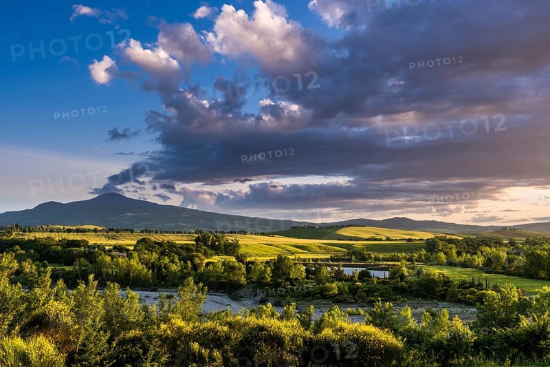 Typical green Tuscan landscape in Val d'Orcia with hills