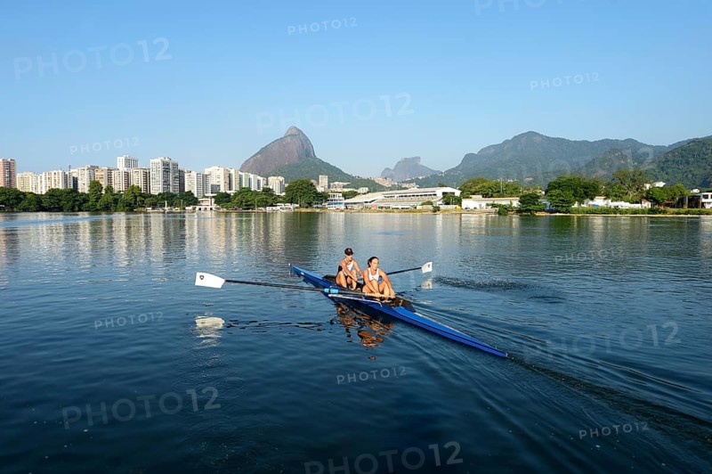 Two young women participating in early morning rowing training in the Lagoa Rodrigo de Freitas Lagoon
