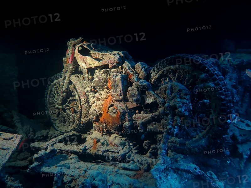 Old motorcycle in the hold of the wreck Thistlegorm