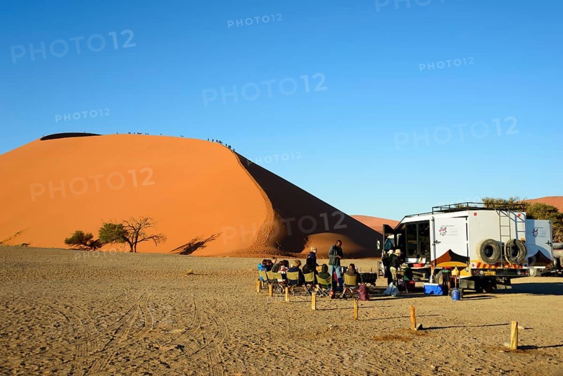 Dune 45 with safari tourists at Namib-Naukluft National Park in the Namib Desert