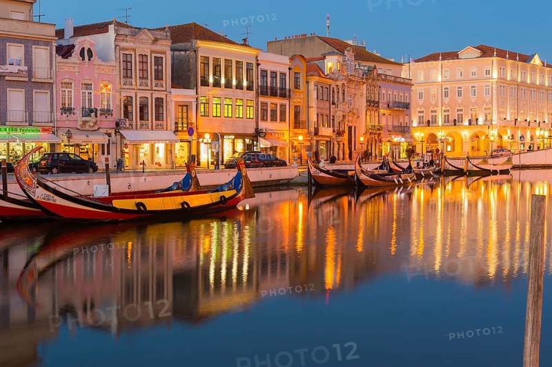 Moliceiros moored along the main canal at dusk