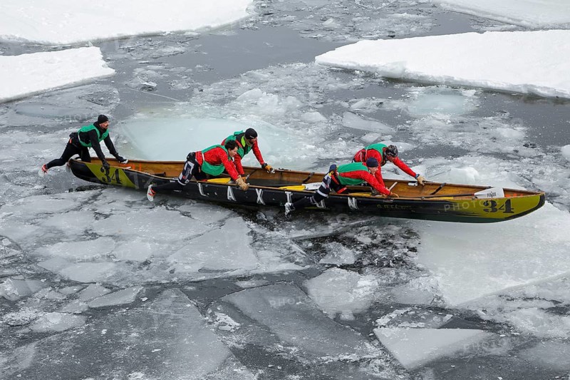 Canoe race challenge over the partly frozen Saint Lawrence River