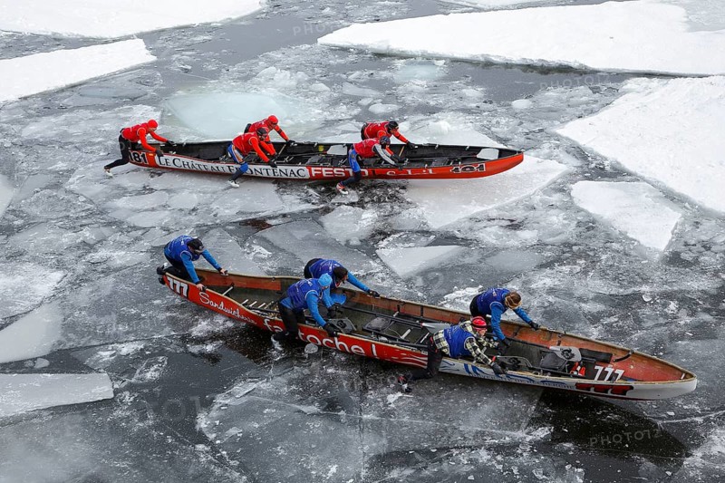 Canoe race challenge over the partly frozen Saint Lawrence River