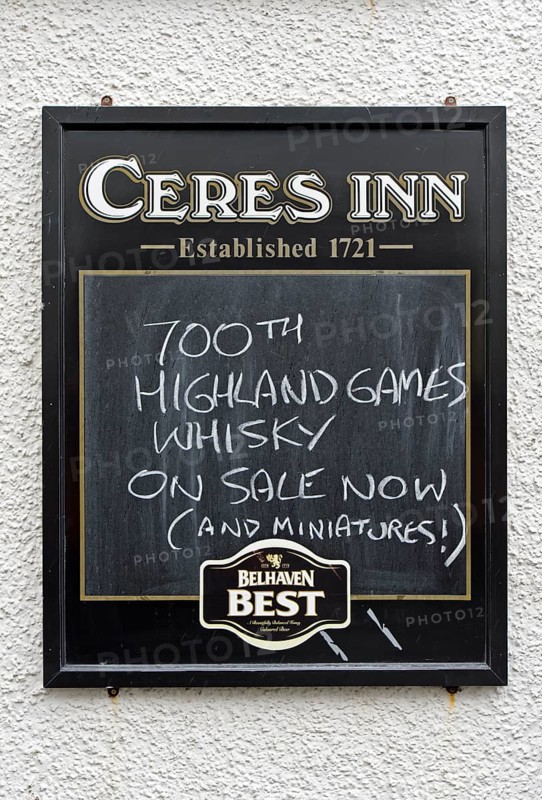 Restaurant sign displaying 700th Highland Games Whiskey