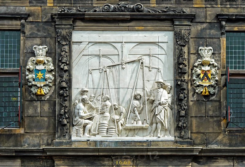 Waaghaus relief depicting weighing of cheese in ancient times