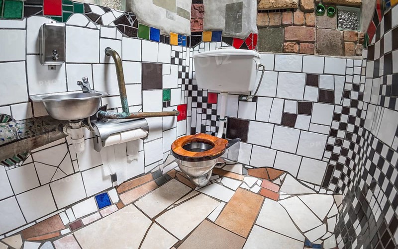 Ladies toilet with ceramic tiles in the public toilet of the artist and architect Friedensreich Hundertwasser