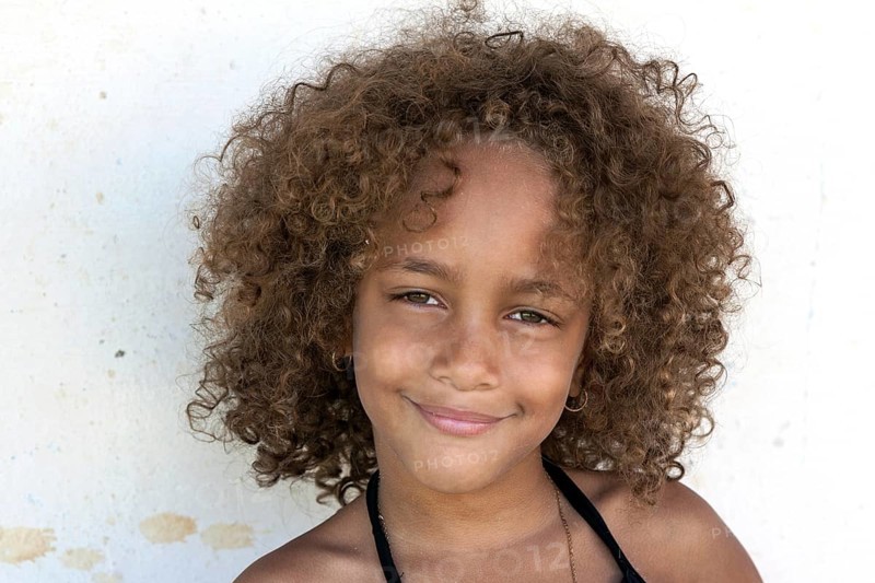 Local Cuban girl with curly hair