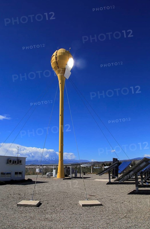 Heliostats reflecting sunrays to receiver tower