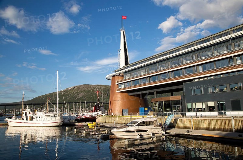 Modern architecture of Scandic Hotel with boats in harbour