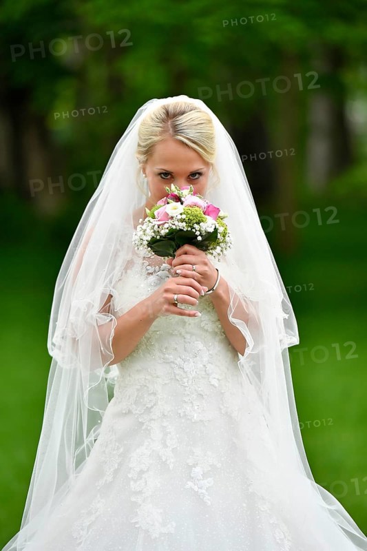 Bride in wedding dress with veil