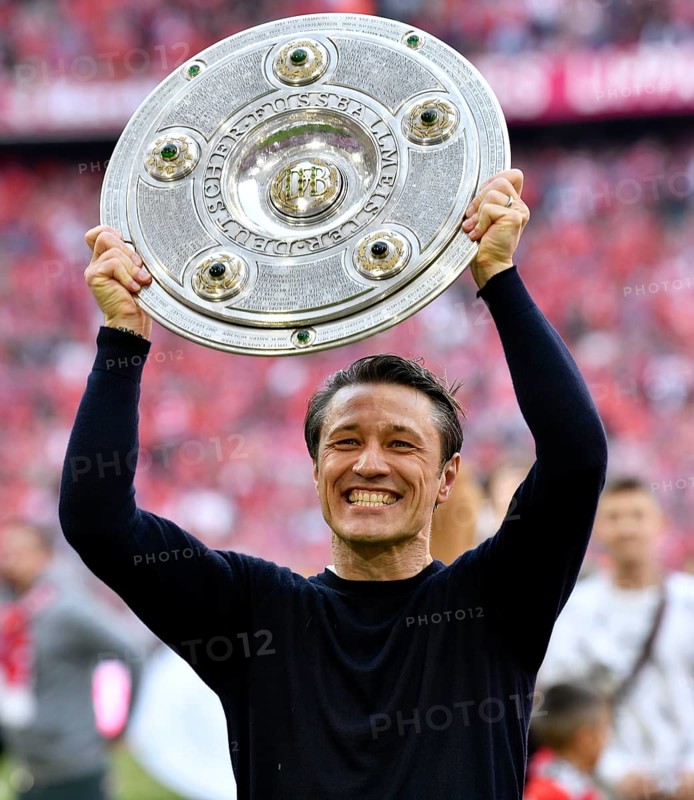 Coach Coach Niko Kovac FC Bayern Munich FCB cheers with championship cup
