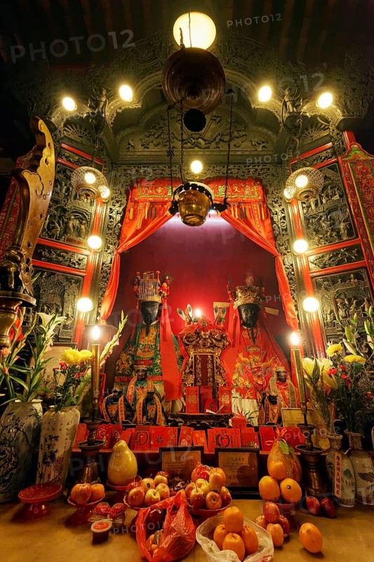 Altar with statues of gods Man and Mo