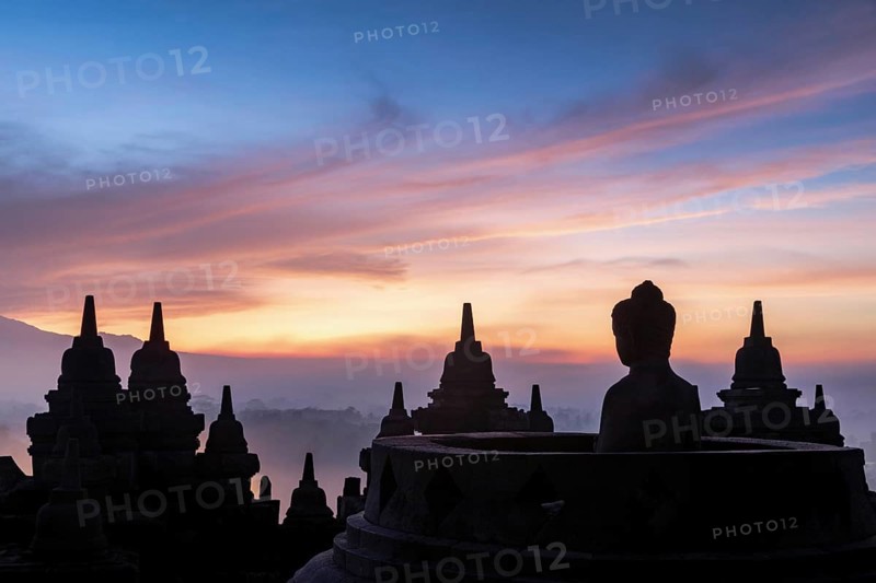 Buddha statue at sunrise