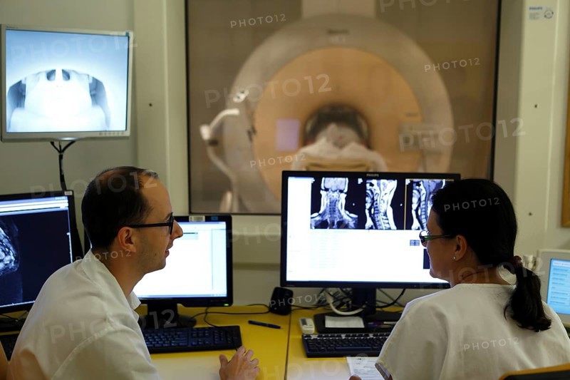 Doctors at RDG Radiology screen examination