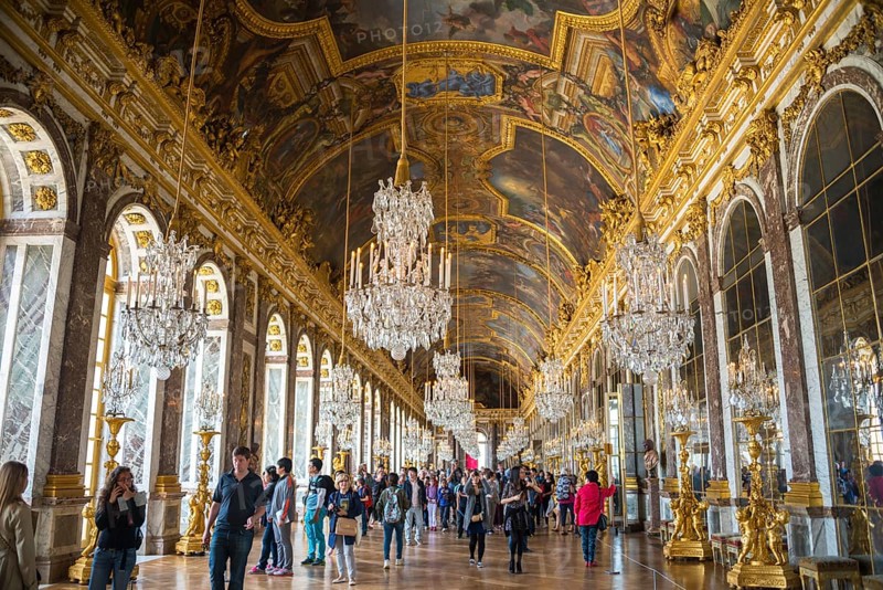 Visitors in the Hall of Mirrors