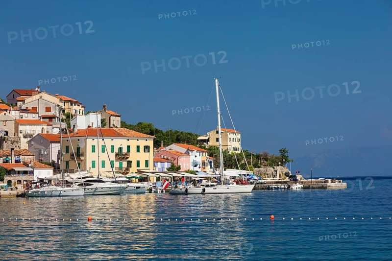 Small fishing village with sailing boats