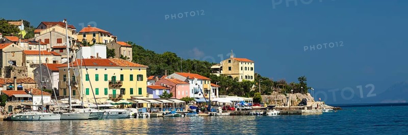 Small fishing village with sailing boats