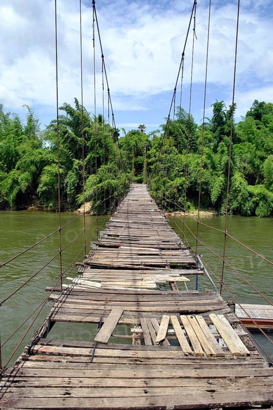 Dilapidated suspension bridge over River Kwai