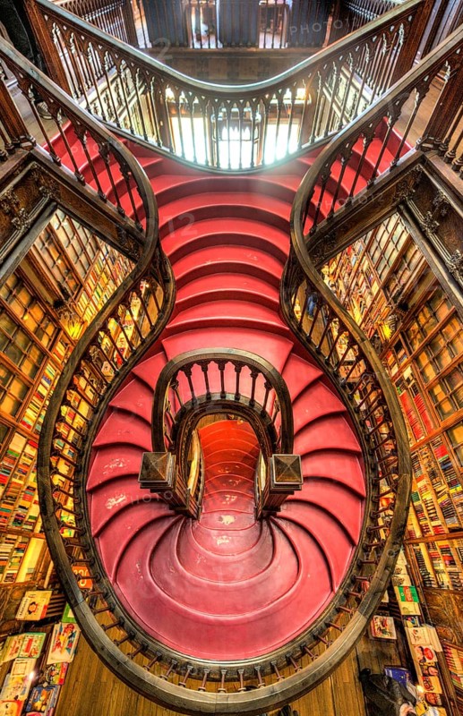 Curved wooden staircase in library