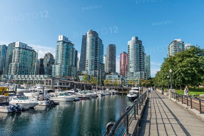 High-rise buildings on the promenade with marina