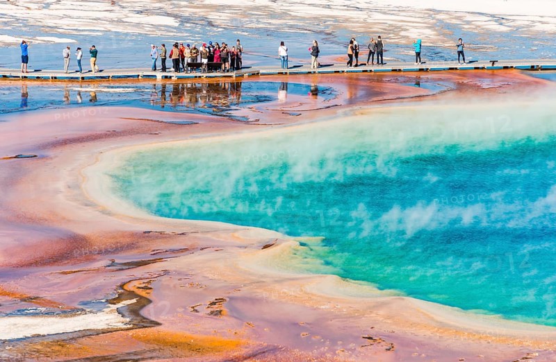 Tourists on a jetty in the thermal area