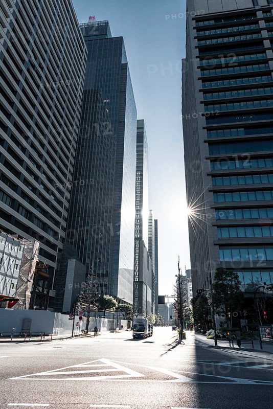 Traffic street in the city center with skyscrapers