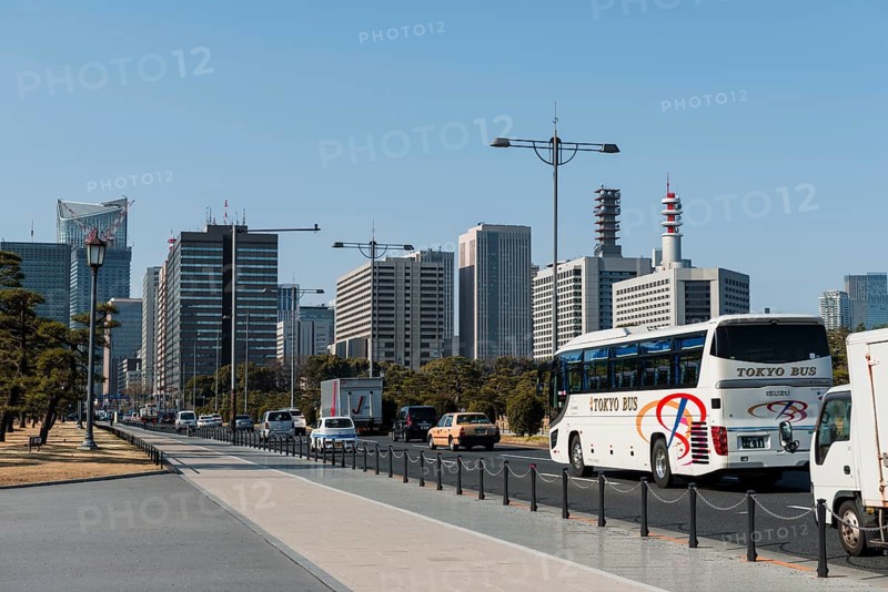 Dense traffic in front of skyscrapers