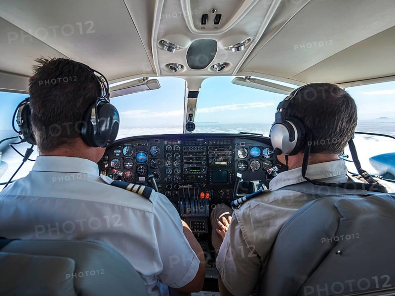 Two pilots in a cockpit