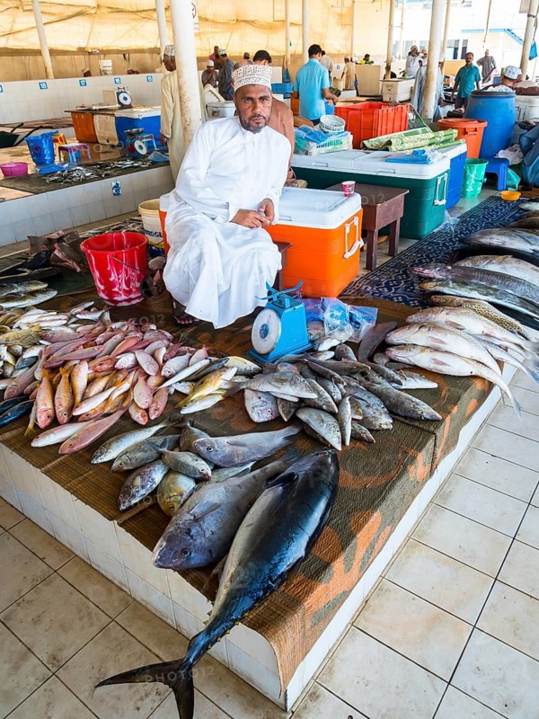 Merchant with various fish