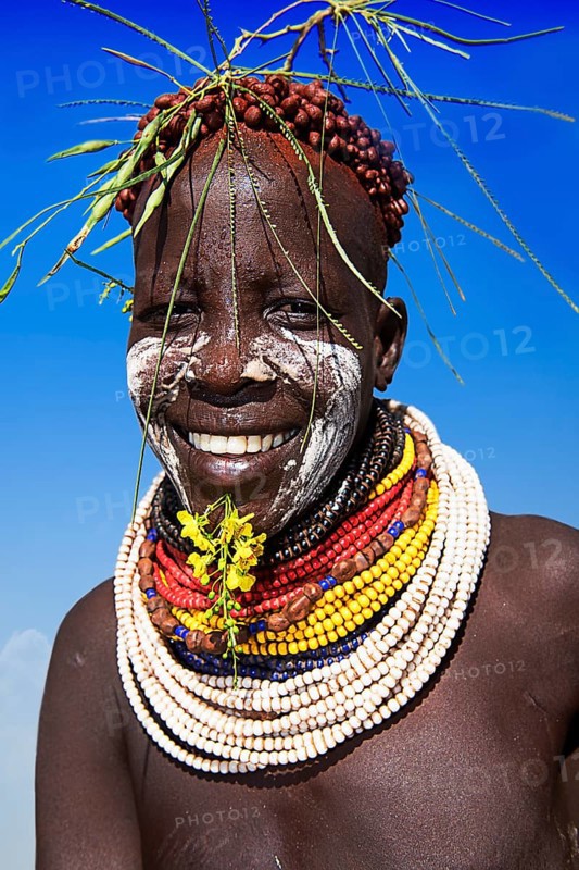 Woman with necklace and headdress